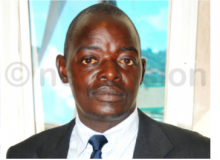 Johnson Mutibwa of MDC in Uganda at Civil Division High Court shortly after deregistration was okayed.<br />Party presidents Apollo Nyabongo (MVMO), and Johnson Mutiibwa (MDC) were present in court. The EC was represented by its head of legal Eric Sabiiti, while Fred Masaba appeared for the Attorney General.